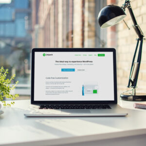 Photo of an open laptop with the Jetpack WordPress plugin website on the screen