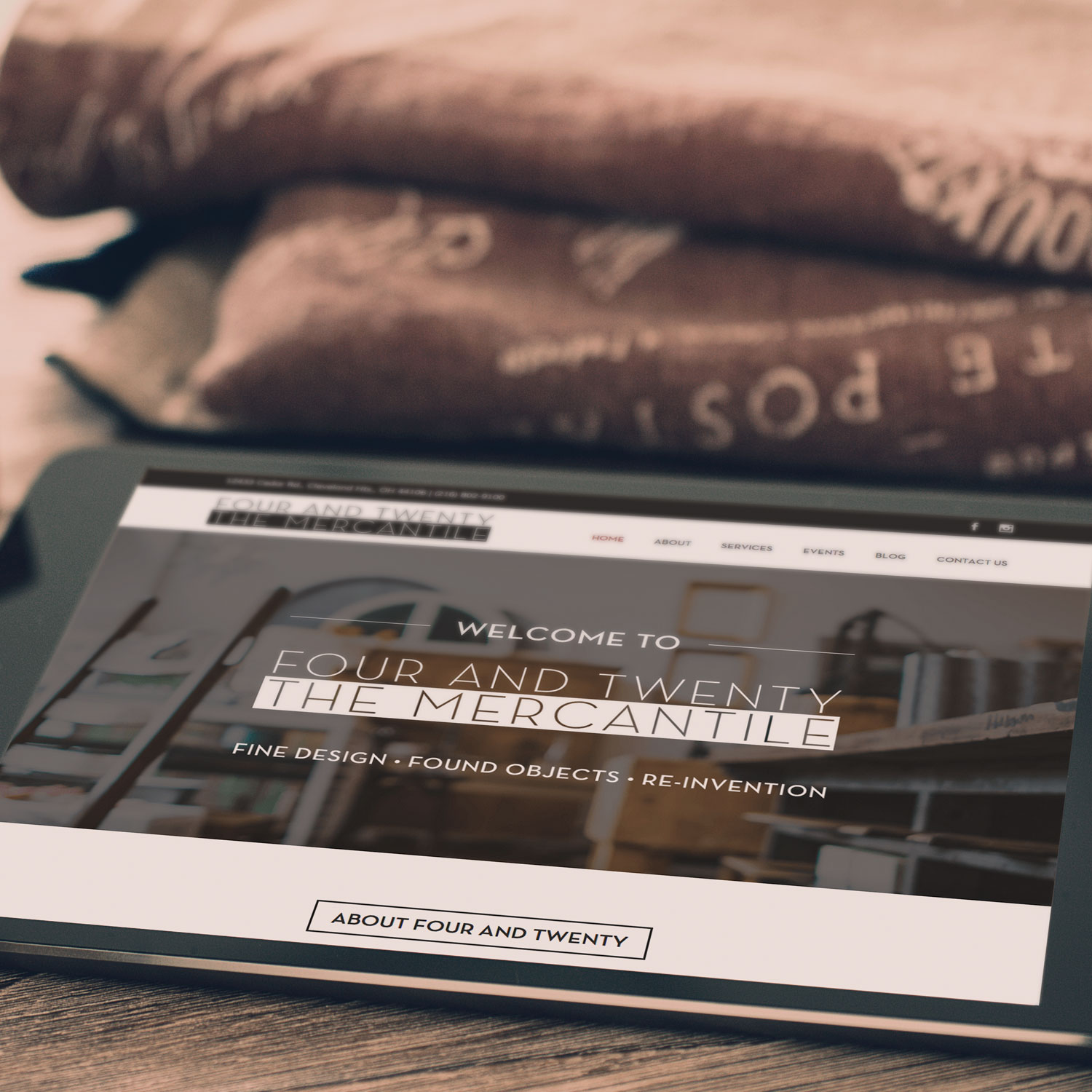 Photo of the new Four and Twenty Mercantile WordPress website loaded on a tablet