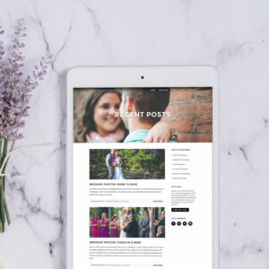Photo of a white tablet with the new Blaz Photography WordPress website loaded
