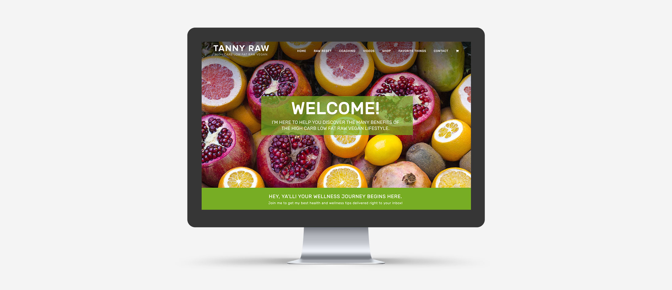 Mockup of the new Tanny Raw WordPress website homepage loaded on a large desktop screen