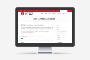 Mockup of the new Junior League of Toledo WordPress website membership application loaded on a large desktop screen