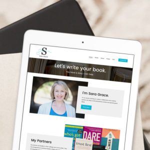Photo of Sara Grace Editorial's new website loaded on a white tablet